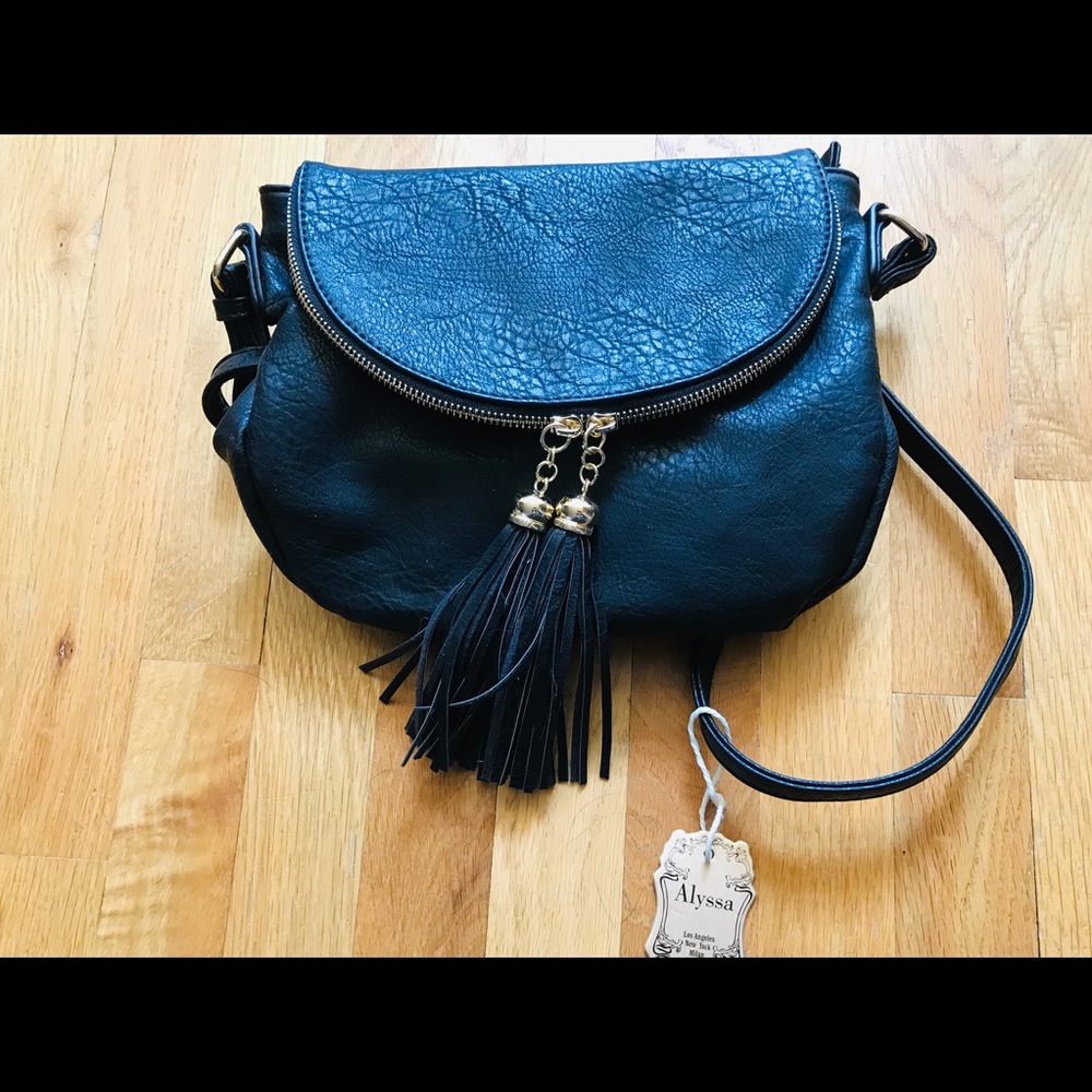 Vegan cross body bag with tassels